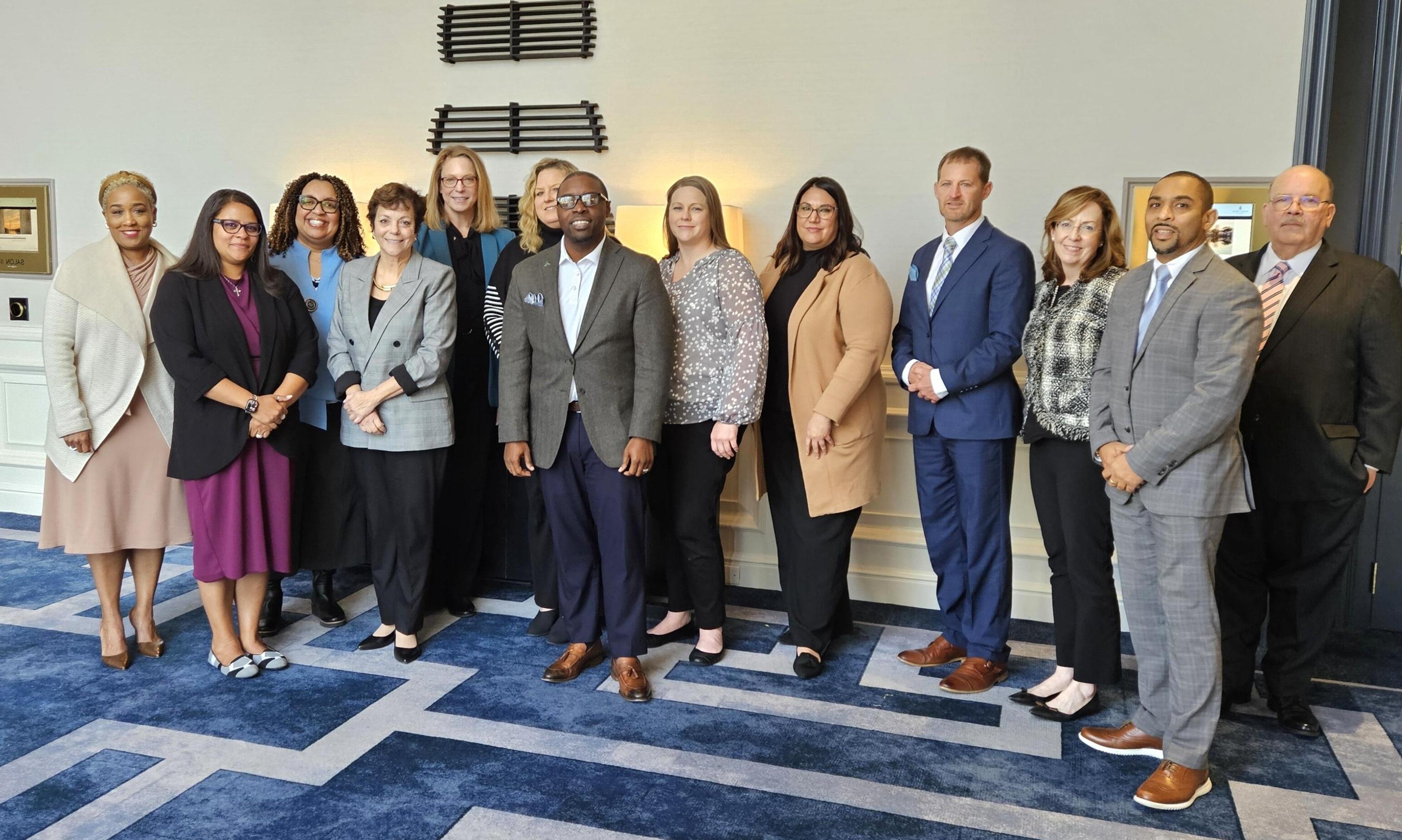 AACC's College Readiness Commission group gathered in a lobby,